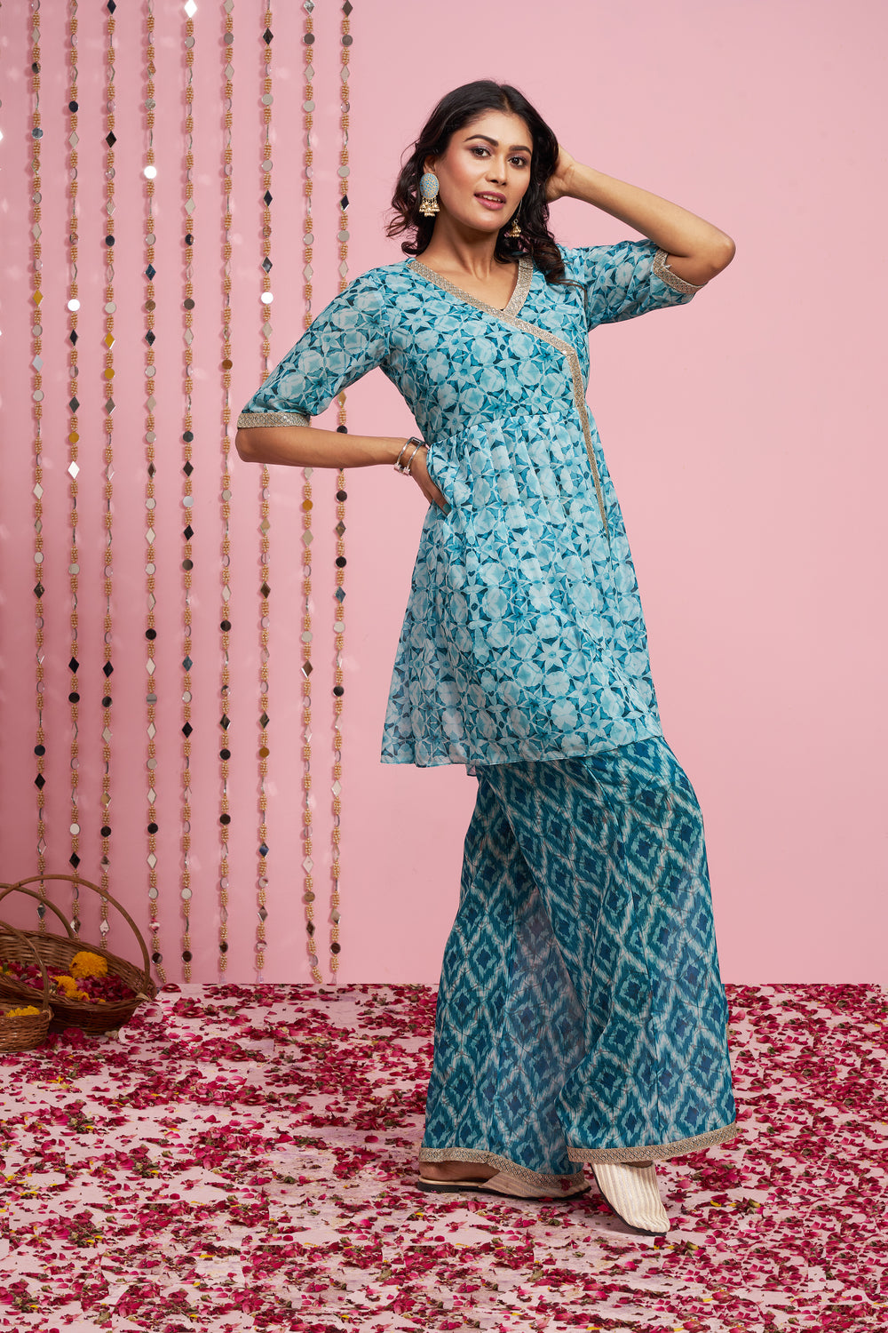 Midnight blue embroidered tunic with palazzo pants set available only at  Pernia's Pop Up Shop. 2024